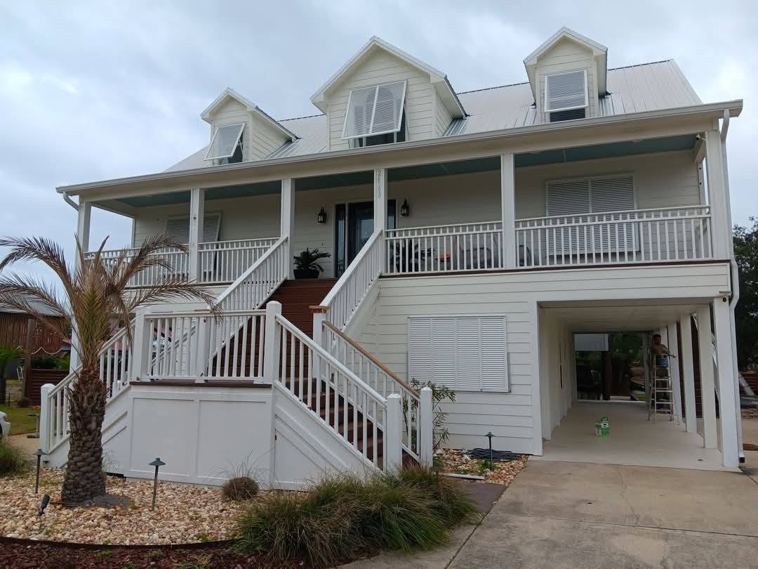Two-story home — before repaint