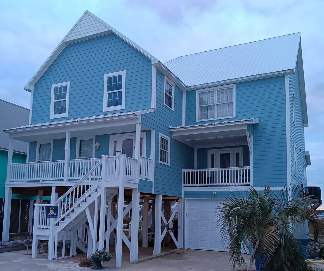 Blue beach house on stilts