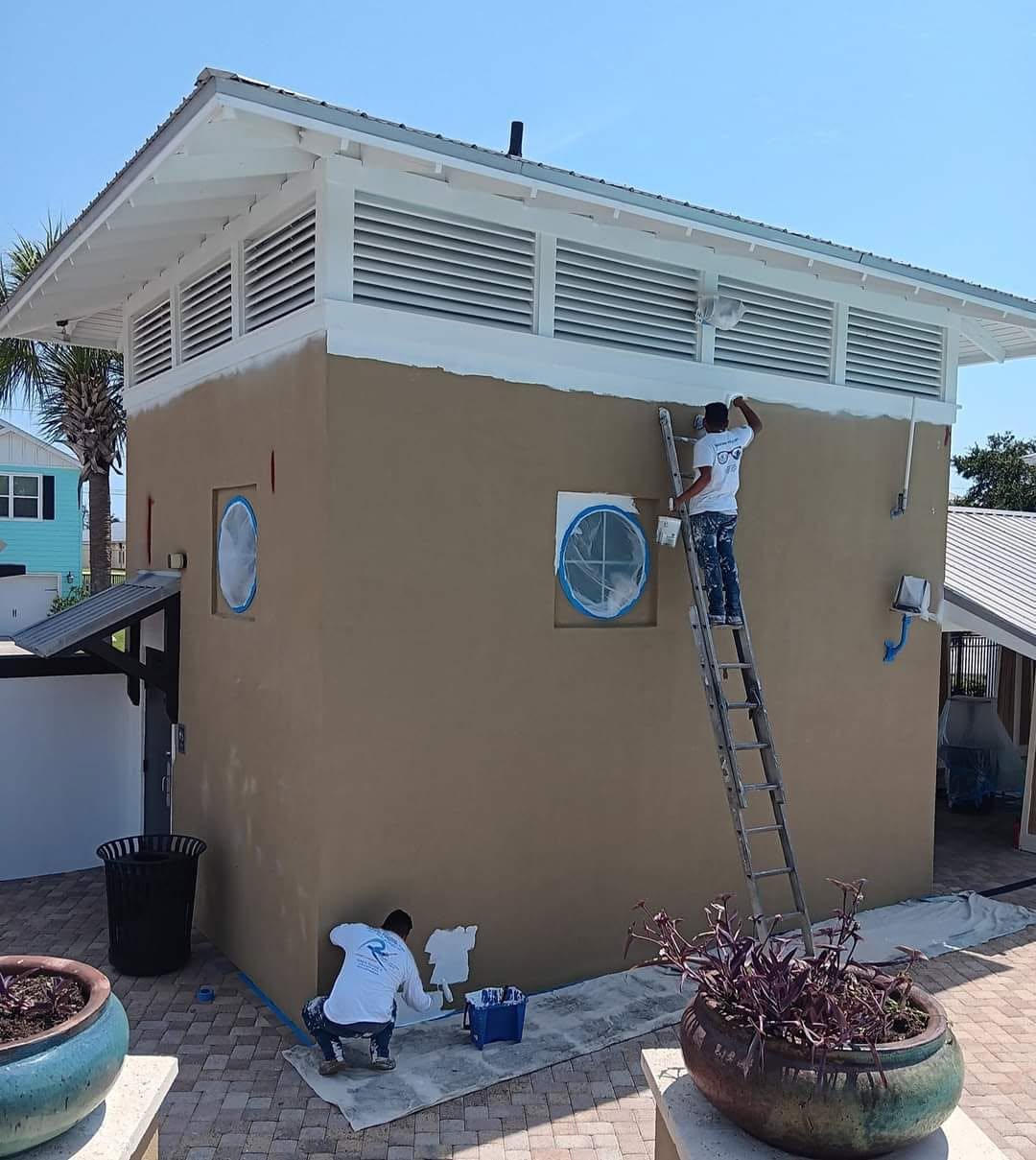 Painting tan stucco pool house on the Gulf Coast